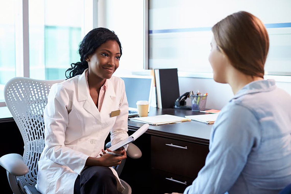 Doctor talking to patient