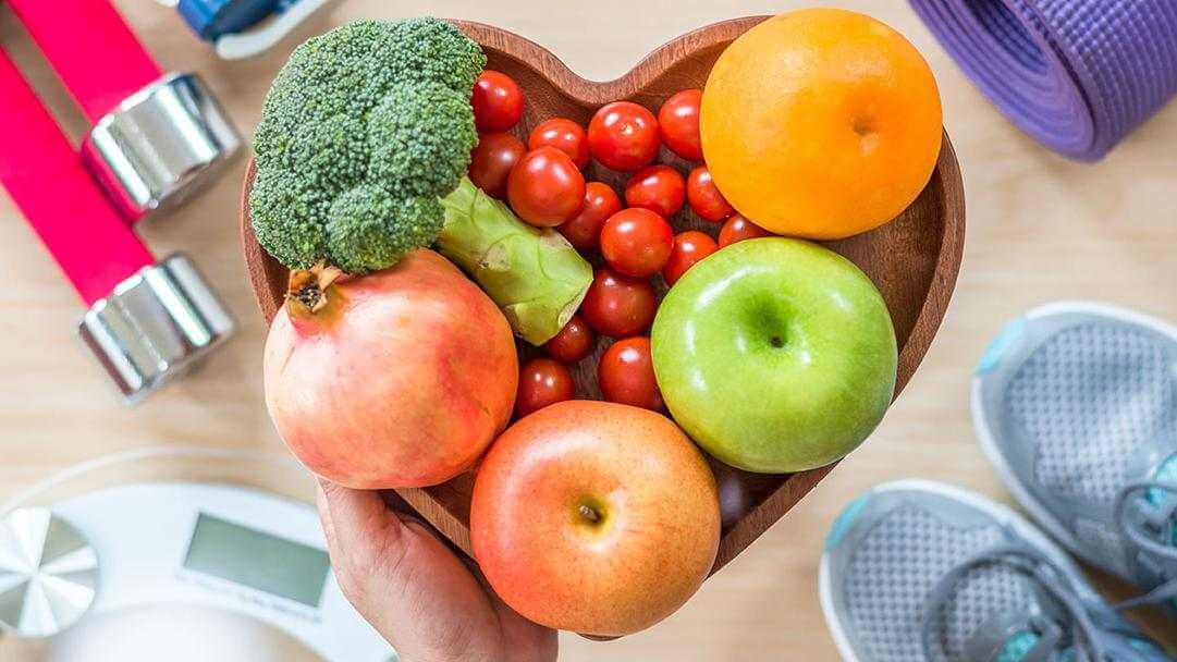 A heart shaped bowl of fruit