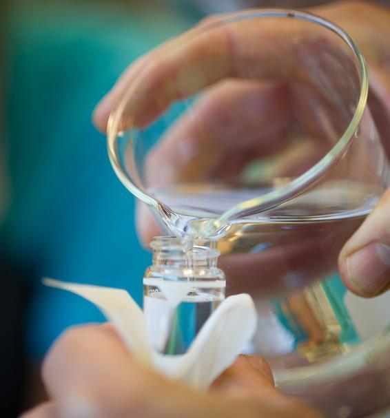 Pouring a sample from a beaker